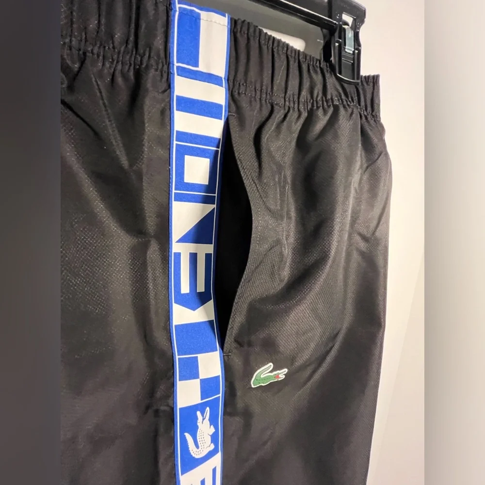 LACOSTE Athletic Pull-on Fully Lined Shorts w/side pockets & Logo Side Bands - Picture 8 of 16